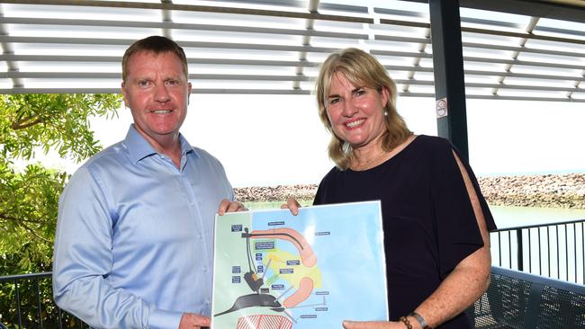 Infrastructure Minister Eva Lawler and Recreational Fishing Minister Paul Kirby with design plans for the $50m rebuild of the Mandorah Jetty. Picture: Katrina Bridgeford