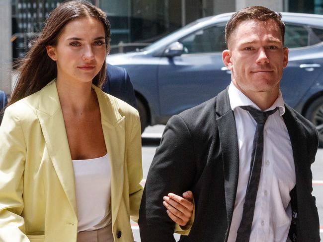 SYDNEY, AUSTRALIA - NewsWire Photos DECEMBER 8, 2022: Tom Starling (right) arrives at Downing centre court this morning with his girlfriend. Picture: NCA NewsWire / David Swift