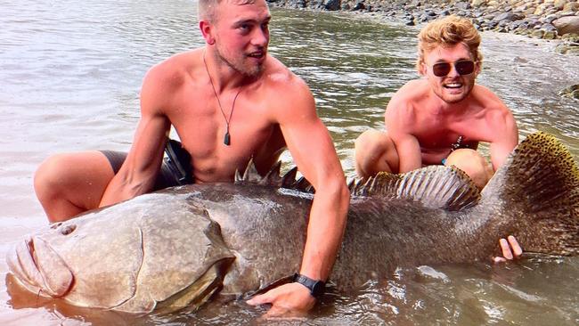 Video creators Ed Hirst and Harry Thomas have managed to land a monster of a giant grouper in Port Douglas. Picture: ed.explores