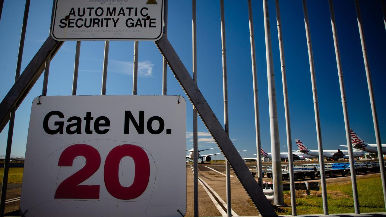 Virgin Australia aircraft parked on the tarmac at Brisbane Airport. Picture: Patrick Hamilton/AFP