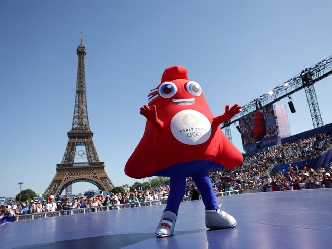 PARIS, FRANCE - AUGUST 05: An Olympic Phryge, the official mascot of the 2024 Paris Olympics, performs at Champions Park on day ten of the Olympic Games Paris 2024 on August 05, 2024 in Paris, France. (Photo by Maja Hitij/Getty Images)