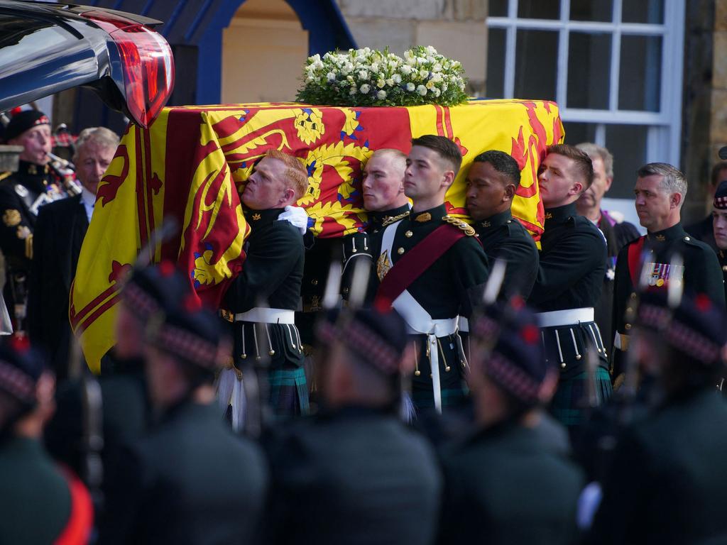 The coffin of Queen Elizabeth II, draped with the Royal Standard of Scotland, leaves the Palace of Holyroodhouse, in Edinburgh. Picture: AFP