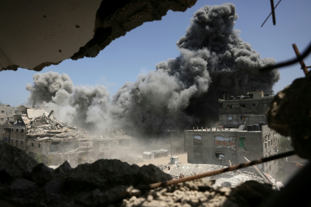 Gaza rescuers say Israeli fire kills 22 near aid site as truce talks falter