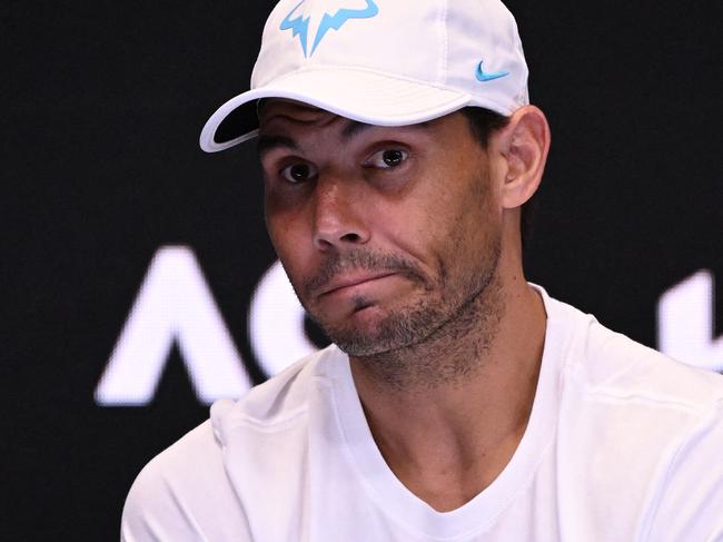 Spain's Rafael Nadal gives a press conference after his men's singles against Mackenzie McDonald of the US on day three of the Australian Open tennis tournament in Melbourne on January 18, 2023. - Defending champion and top seed Rafael Nadal crashed out of the Australian Open in round two to 65th-ranked American Mackenzie McDonald in a major upset Wednesday, his worst Grand Slam result in seven years. (Photo by WILLIAM WEST / AFP) / -- IMAGE RESTRICTED TO EDITORIAL USE - STRICTLY NO COMMERCIAL USE --