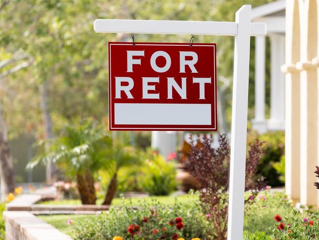 Red For Rent Real Estate Sign in Front House. Picture: iStock - for Herald Sun realestate