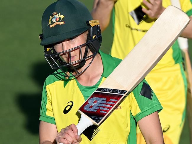 BRISBANE, AUSTRALIA - OCTOBER 05: Meg Lanning of Australia celebrates victory and her century after game two of the Women's International series between Australia and New Zealand at Allan Border Field on October 05, 2020 in Brisbane, Australia. (Photo by Bradley Kanaris/Getty Images)