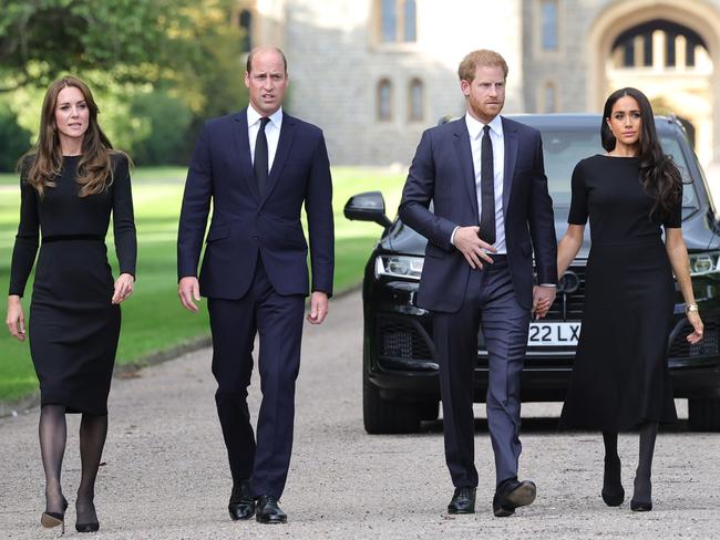 WINDSOR, ENGLAND - SEPTEMBER 10: Catherine, Princess of Wales, Prince William, Prince of Wales, Prince Harry, Duke of Sussex, and Meghan, Duchess of Sussex on the long Walk at Windsor Castle on September 10, 2022 in Windsor, England. Crowds have gathered and tributes left at the gates of Windsor Castle to Queen Elizabeth II, who died at Balmoral Castle on 8 September, 2022. (Photo by Chris Jackson - WPA Pool/Getty Images)