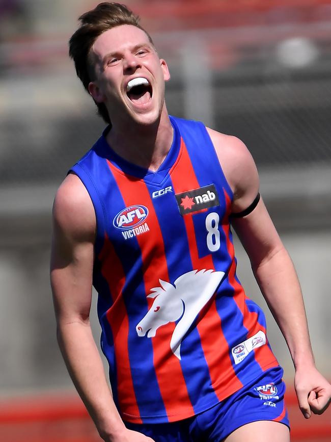 Noah Anderson celebrates a goal for the Oakleigh Chargers.