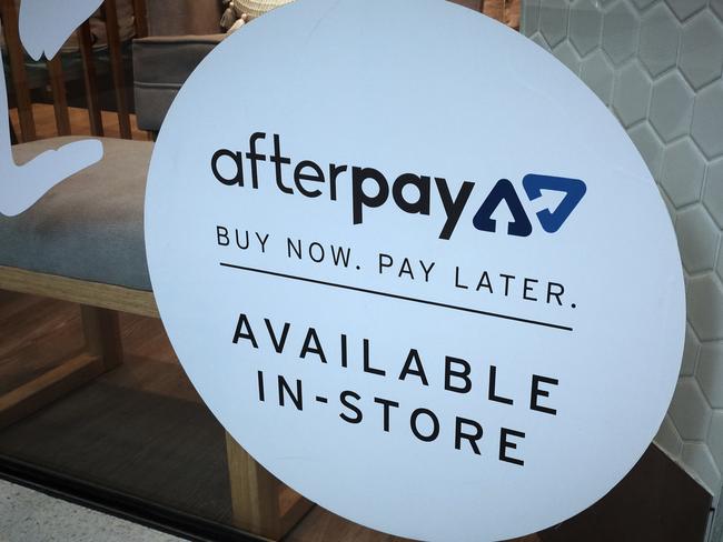 An Afterpay sign is seen in a store window in a shopping centre in Sydney, Tuesday, February 26, 2019. (AAP Image/Derek Rose) NO ARCHIVING