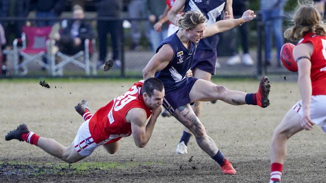 Kurt Lo Po of Edithvale-Aspendale is tackled. Picture: Valeriu Campan