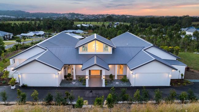 This four-bedroom house at 12 Holstein Close, Kingsholme, is on the market for offers over $2.85m.