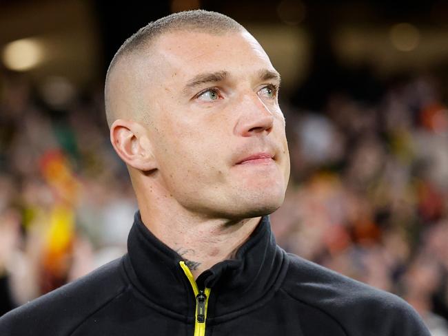 MELBOURNE, AUSTRALIA – AUGUST 24: Retiree Dustin Martin of the Tigers looks on while participating in a lap of honour during the 2024 AFL Round 24 match between the Richmond Tigers and the Gold Coast SUNS at The Melbourne Cricket Ground on August 24, 2024 in Melbourne, Australia. (Photo by Dylan Burns/AFL Photos via Getty Images)