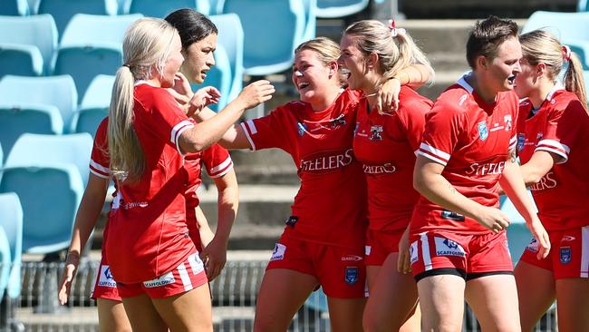 Try time. The Illawarra Steelers celebrating a try against the Rabbitohs. Photo: Denis Ivaneza