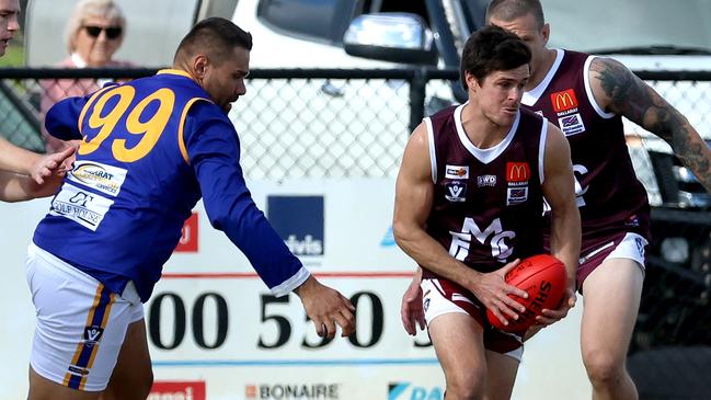 Ballarat: Melton’s Jack Walker breaks clear of the pack. Picture: Hamish Blair