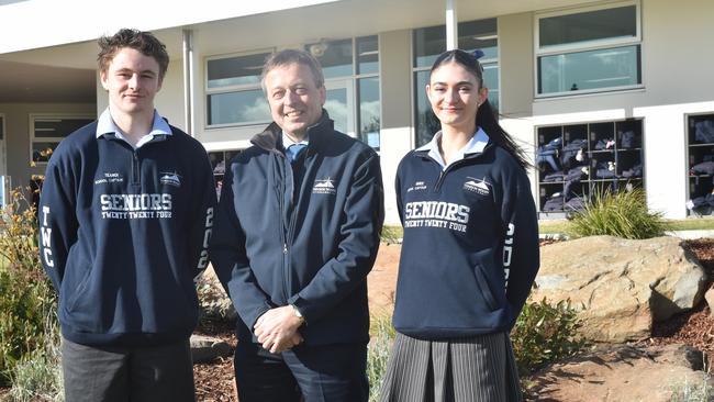 Tenison Woods College principal David Mezinec and 2024 college captains Teangi Stephens and Bree Robinson. Picture: Jessica Dempster