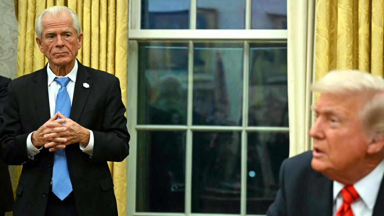 Peter Navarro (left) says Australia is flooding the US aluminium market. Picture: Andrew Caballero-Reynolds / AFP