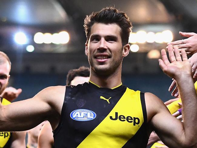 MELBOURNE, AUSTRALIA - AUGUST 17:  Alex Rance of the Tigers high fives fans after winning the round 22 AFL match between the Richmond Tigers and the Essendon Bombers at Melbourne Cricket Ground on August 17, 2018 in Melbourne, Australia.  (Photo by Quinn Rooney/Getty Images)