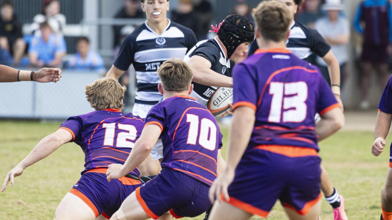 Adam Kelly of Met East against Sunshine Coast.