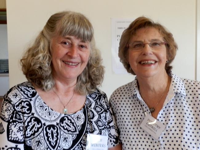 Lyn Watkins, left, and Dorothy Cuthill at the launch of Lindisfarne Heritage - Volume II, published by the Lindisfarne Historical Society. . Picture: REG WATSON