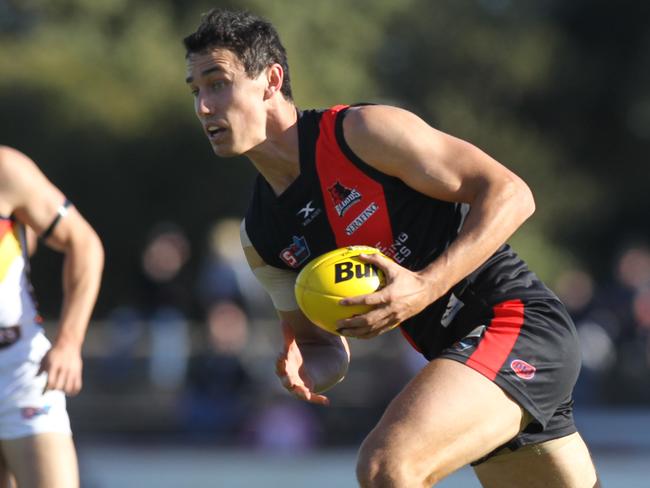 SANFL: West Adelaide v Adelaide at Richmond Oval. 8 June 2019. West's Tom Keough clears.  (AAP Image/Dean Martin)