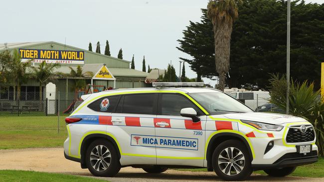 Paramedics leave the Torquay airport after a skydiving accident in December last year. Picture: Alison Wynd