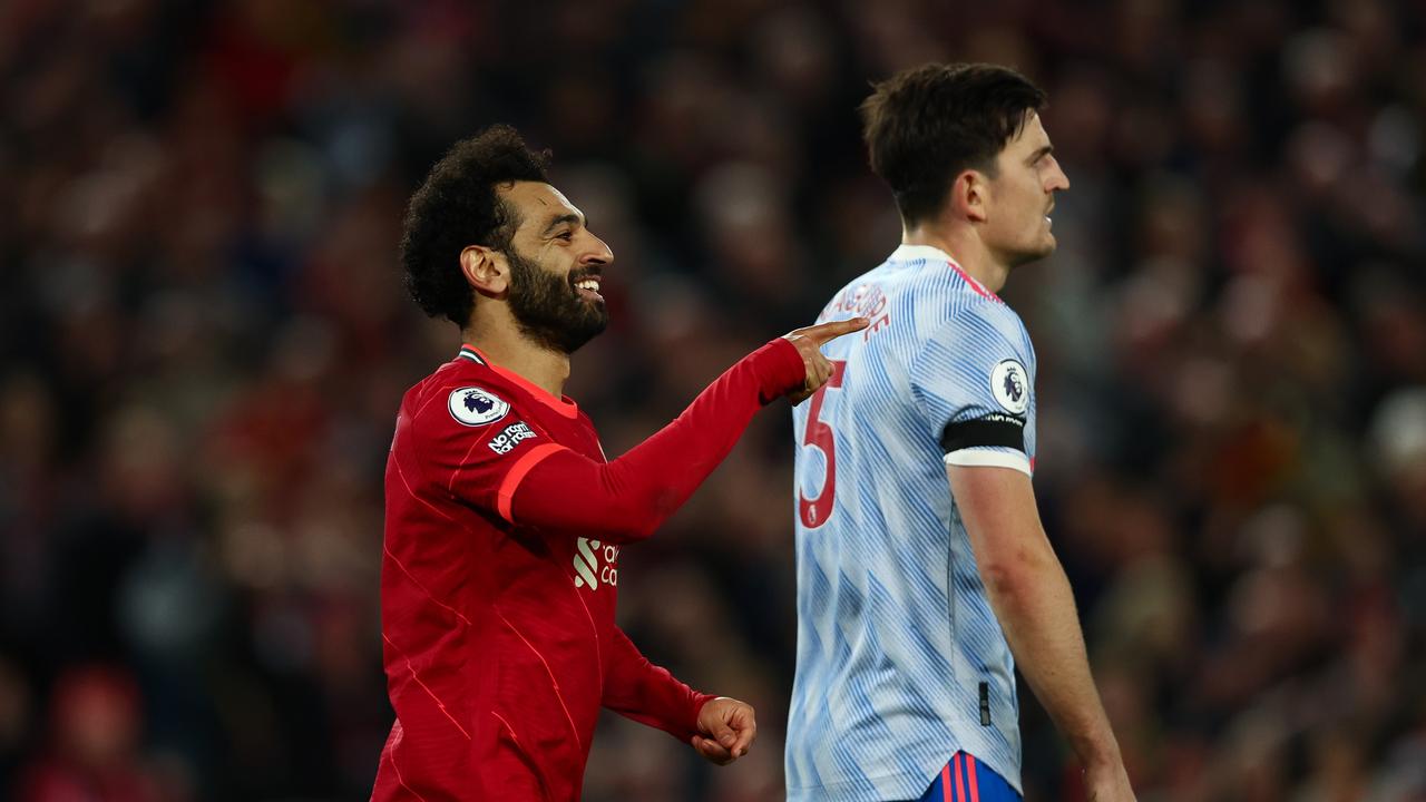 LIVERPOOL, ENGLAND - APRIL 19: Mohamed Salah of Liverpool celebrates scoring their side's fourth goal during the Premier League match between Liverpool and Manchester United at Anfield on April 19, 2022 in Liverpool, England. (Photo by Clive Brunskill/Getty Images)