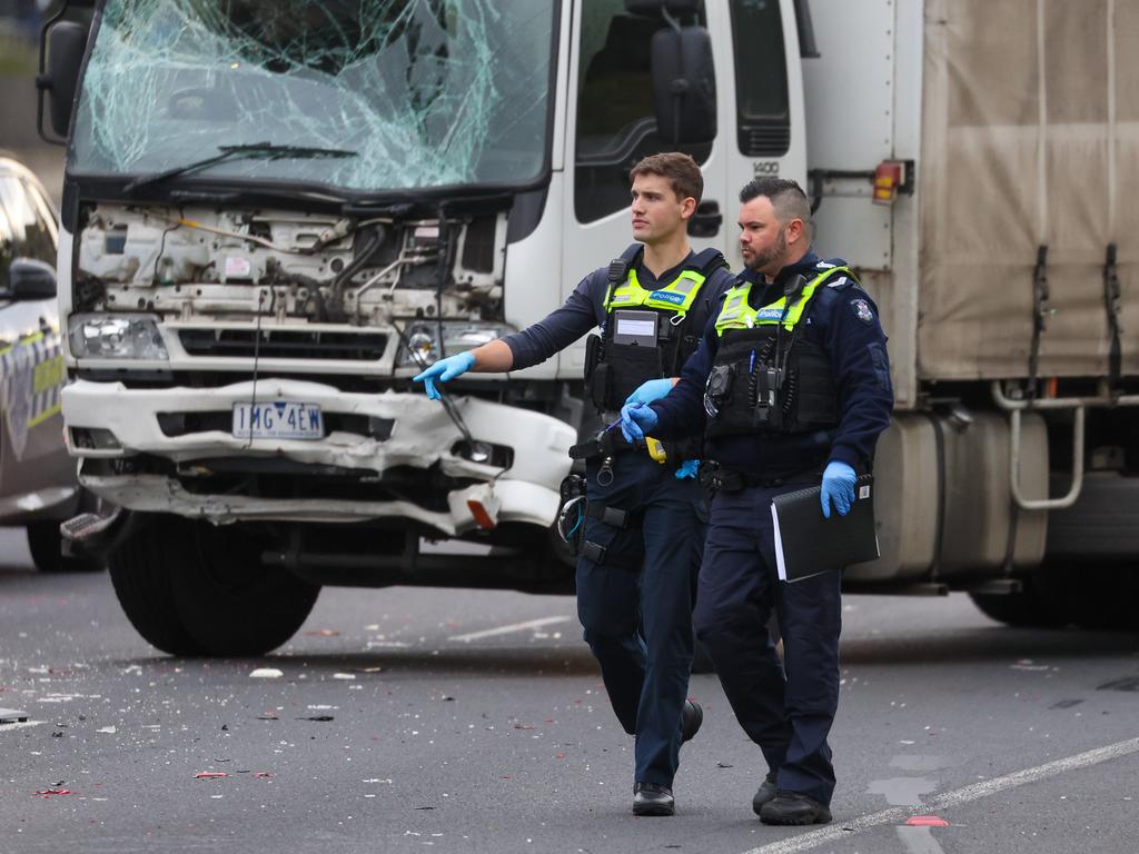 Police at the scene early Wednesday morning. Picture: Brendan Beckett