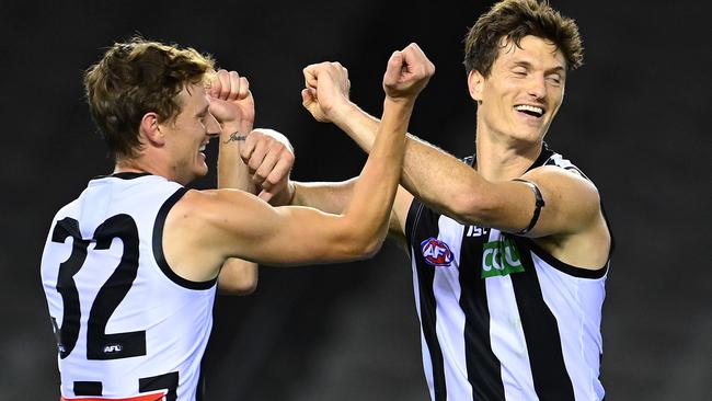 Magpie Brody Mihocek (right) is waiting to sign a new contract.