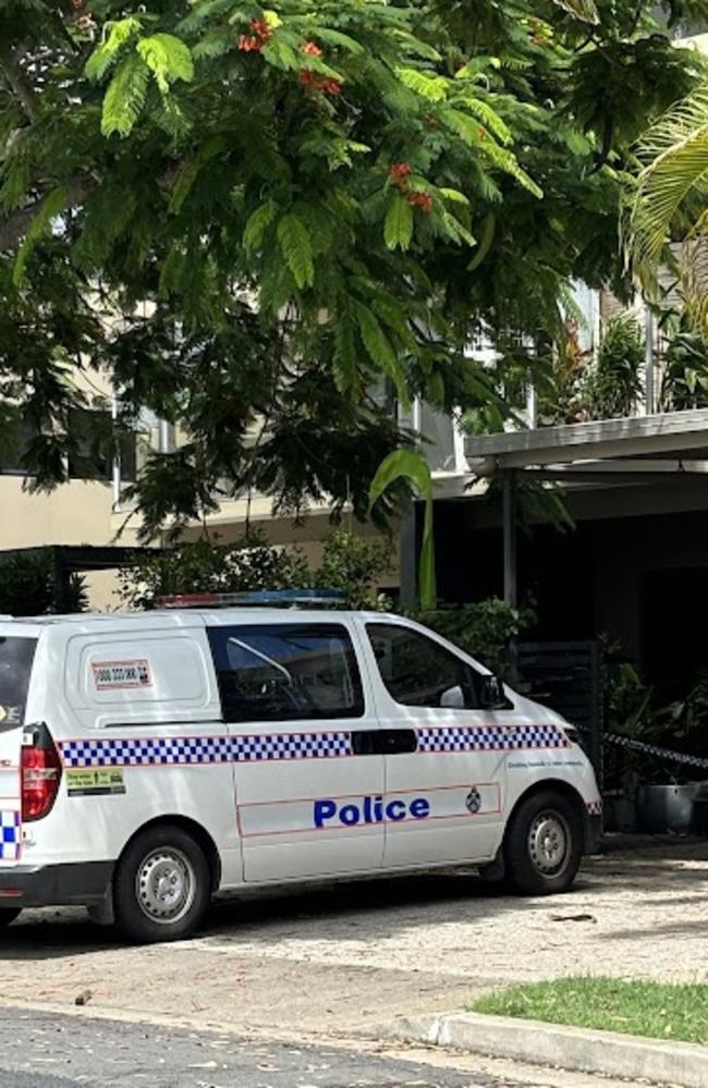 Police at the scene of a complex on the corner of King and Sandy Streets where the bodies of Bryan Monk and Janice Walker were found inside.