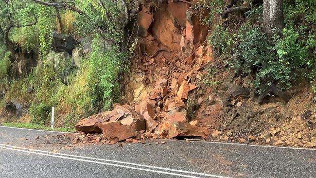 A rock slide on the Captain Cook HIghway reduced traffic to one lane south of Oak Beach on Tuesday. PHOTO: Queensland Police