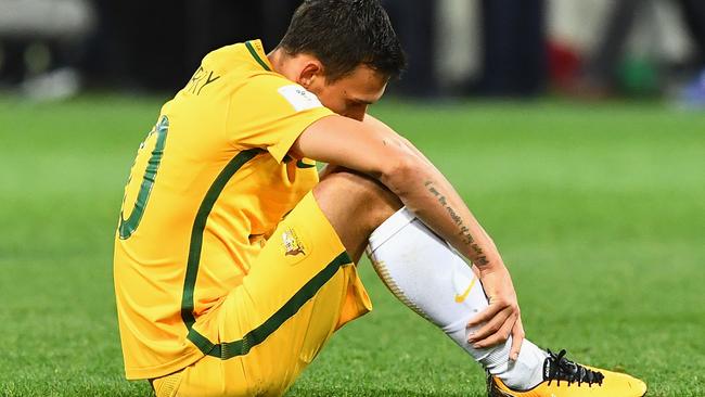 Trent Sainsbury of Australia reacts after the full time whistle.