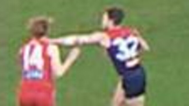 A screenshot of Tom Bugg's hit on Swan Callum Mills.