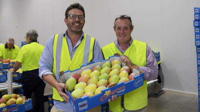 Seaway Logistics NT general manager Rob Hall with NT Farmers chief executive Paul Burke at the packing store rooms ahead of their overseas shipment. Picture: (A)manda Parkinson