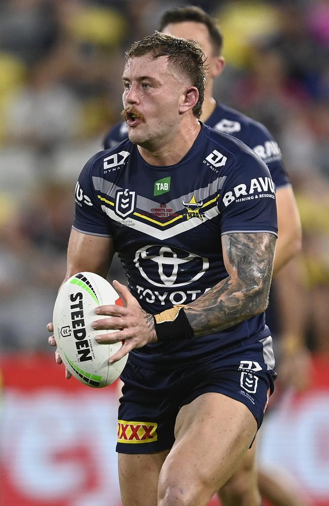 Sam McIntyre of the Cowboys runs the ball during the round 16 NRL match between North Queensland Cowboys and Penrith Panthers at Qld Country Bank Stadium on June 16, 2023 in Townsville, Australia. (Photo by Ian Hitchcock/Getty Images)