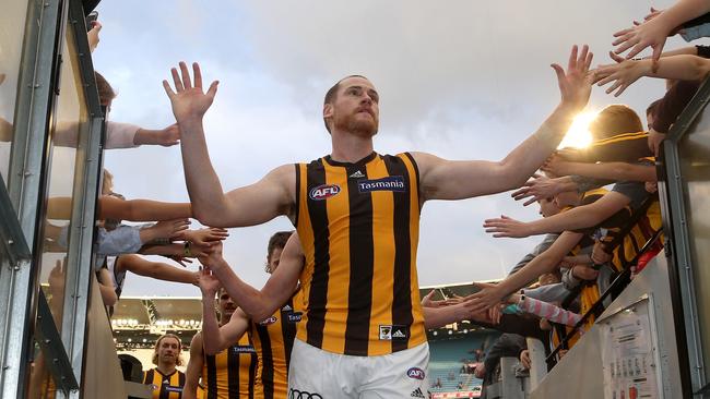 Jarryd Roughead celebrates with fans after a Hawthorn win. Picture: AAP Images