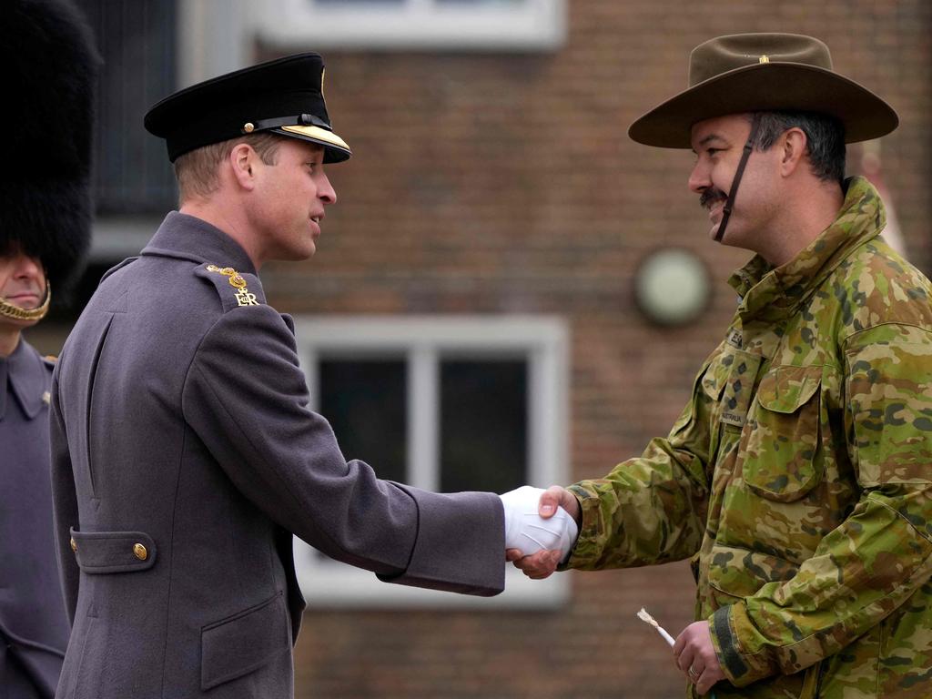 Prince William greets an Australian soldier in Windsor. Picture: AFP