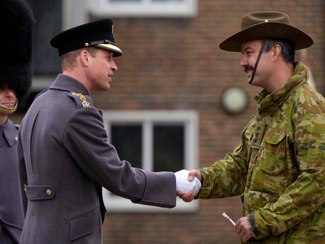 Prince William greets an Australian soldier in Windsor. Picture: AFP