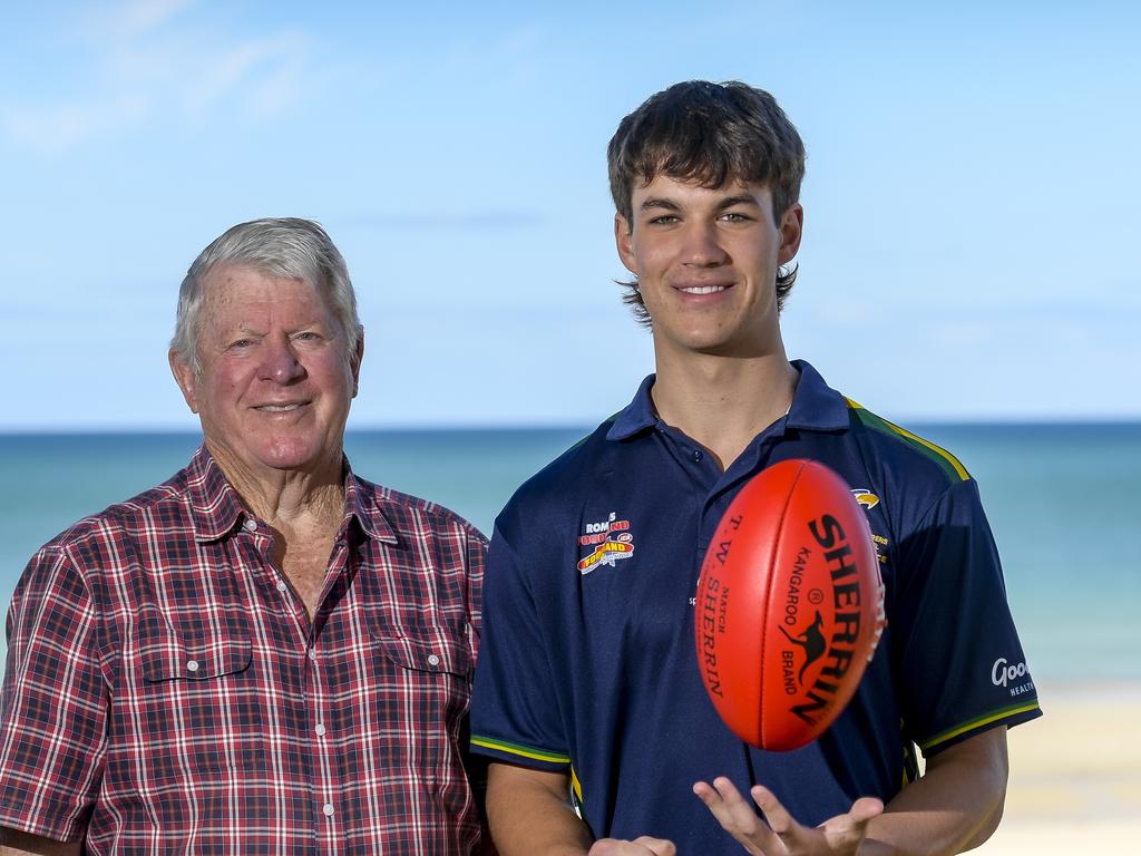 Charlie West with his grandpa, ex-AFL chief executive Wayne Jackson. Picture: RoyVPhotography