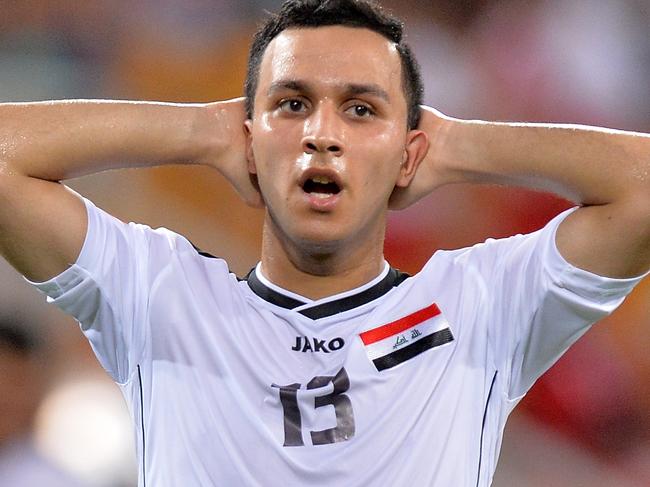 BRISBANE, AUSTRALIA - JANUARY 16: Osamah Jabbar Shafeeq of Iraq looks dejected after his team loses the 2015 Asian Cup match between Iraq and Japan at Suncorp Stadium on January 16, 2015 in Brisbane, Australia. (Photo by Bradley Kanaris/Getty Images)