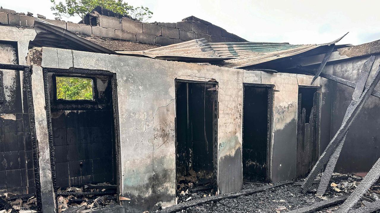 View of the school dormitory that caught fire. (Photo by Keno GEORGE / AFP)