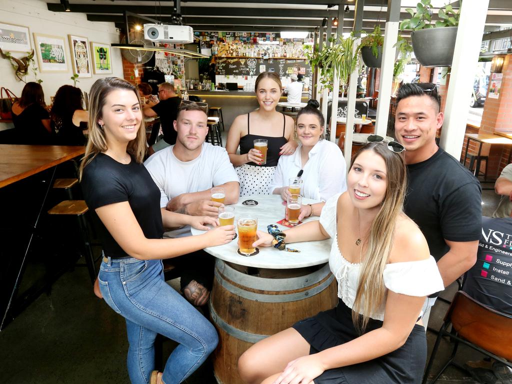 The ban on pubs could last for six months, the PM said. Pictured, a group of friends having drinks in Brisbane earlier this month. Picture: Steve Pohlner