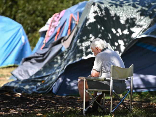 BRISBANE, AUSTRALIA - NewsWire Photos - FEBRUARY 27, 2025.A homeless man sits outside his tent in Woody Point, north of Brisbane. The Moreton Bay council made homeless camping a crime.Picture: Dan Peled / NewsWire