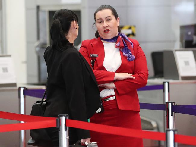 Virgin staff at Brisbane Airport after the company axed 3000 jobs. Photographer: Liam Kidston