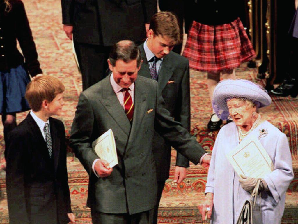 Prince Harry as a child with his father and the Queen Mother. Picture: AP