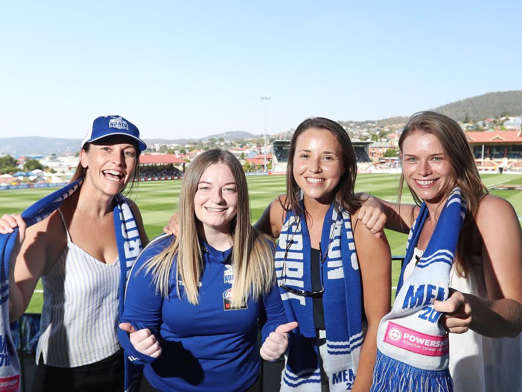 North Melbourne fans Olivia Jarvis, left, Kristi Jenkins, Noni Taylor and Lauren Boothby flew across from Melbourne today. Picture: LUKE BOWDEN