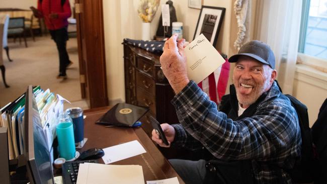 Rioter Richard Barnett inside the office of US Speaker of the House Nancy Pelosi on January 6 last year. Picture: AFP