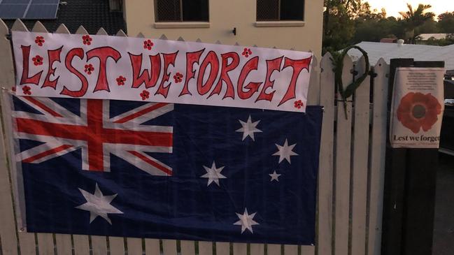 Anzac Day on a fence at Shailer Park