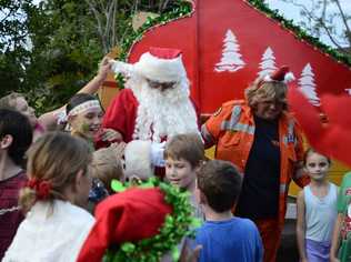 Santa Claus, pictured at the Grafton Christmas Carols on Monday. He will be at Goonellabah tomorrow for a community Christmas party. Picture: Debrah Novak