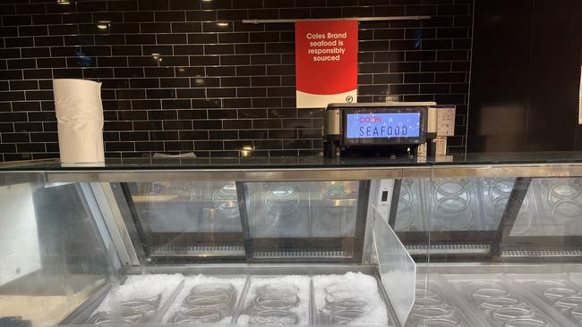 Seafood section at coles empty after floods block supply runs, Mackay Sydney Street Coles, February 5, 2025