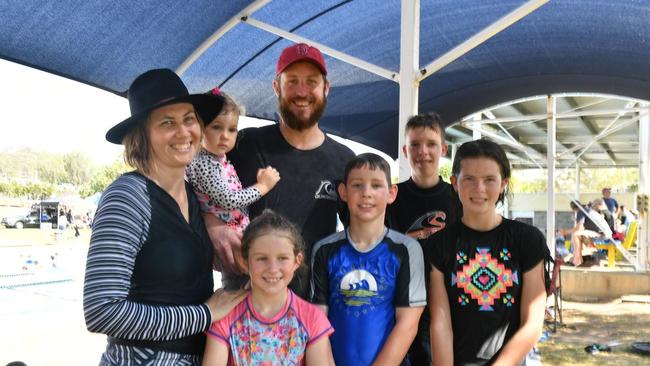 Kylie Seng, Abigail Brennan, James Brennan, Jett Harch (front) Josey Brennan, Jack Brennan and Lulu Harch at the QAL end of year family event at the Gladstone Pool on December 7.